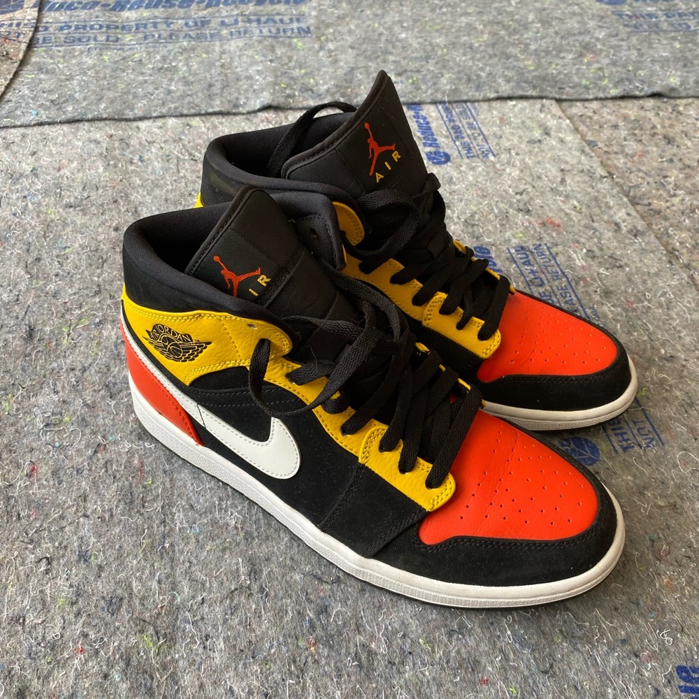 Jordan Black, Yellow, and Red High-Top Sneakers